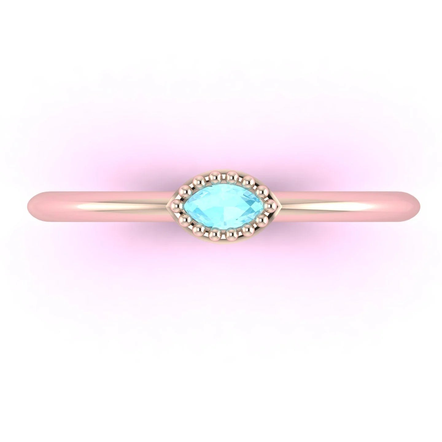 Top view of Mini Astraea 18ct rose gold ring featuring a horizontally set marquise-cut aquamarine.
