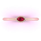 Top view of Mini Astraea 18ct rose gold ring featuring a horizontally set marquise-cut ruby.