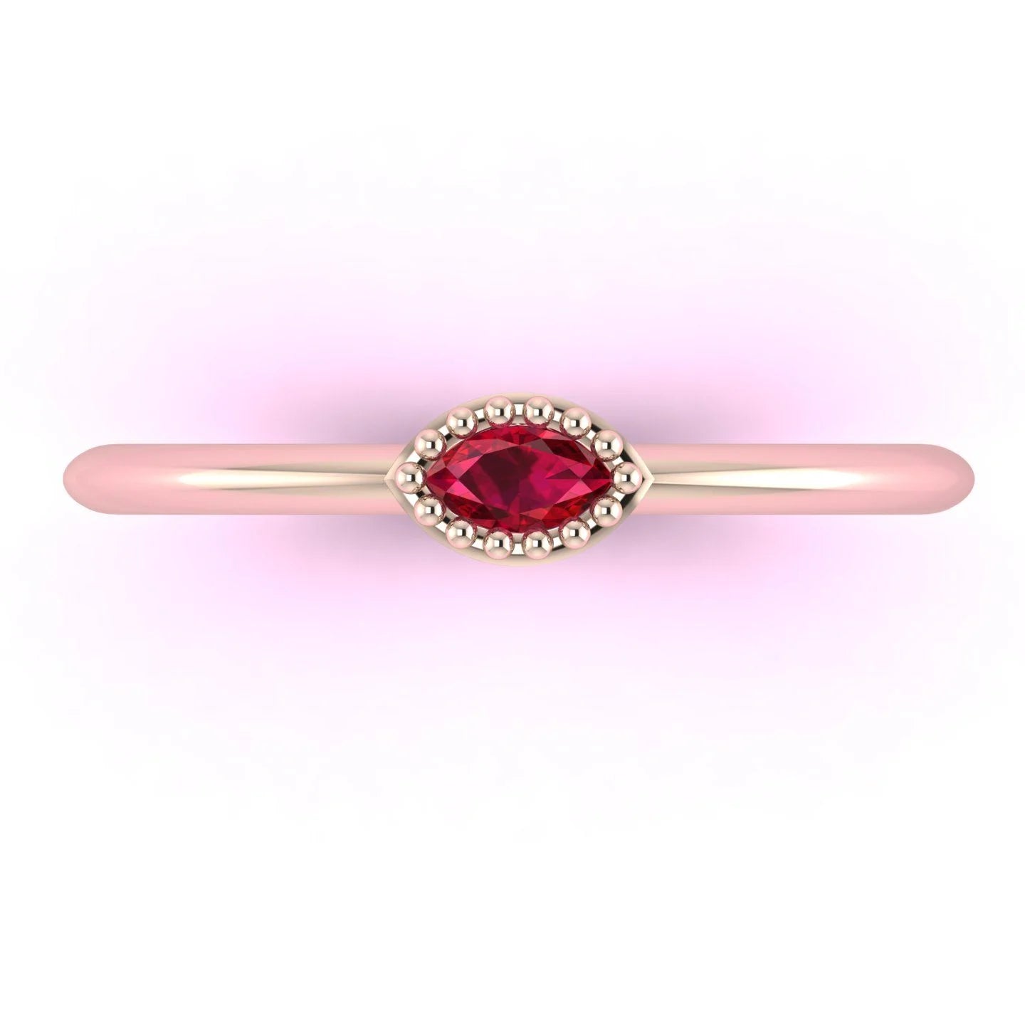 Top view of Mini Astraea 18ct rose gold ring featuring a horizontally set marquise-cut ruby.