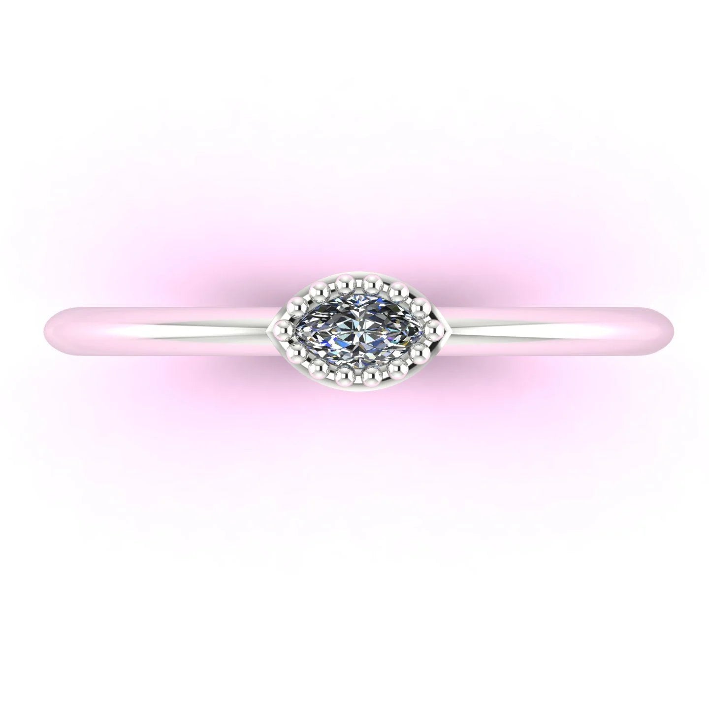 Top view of a dainty marquise diamond ring in 18ct white gold with beaded detailing.