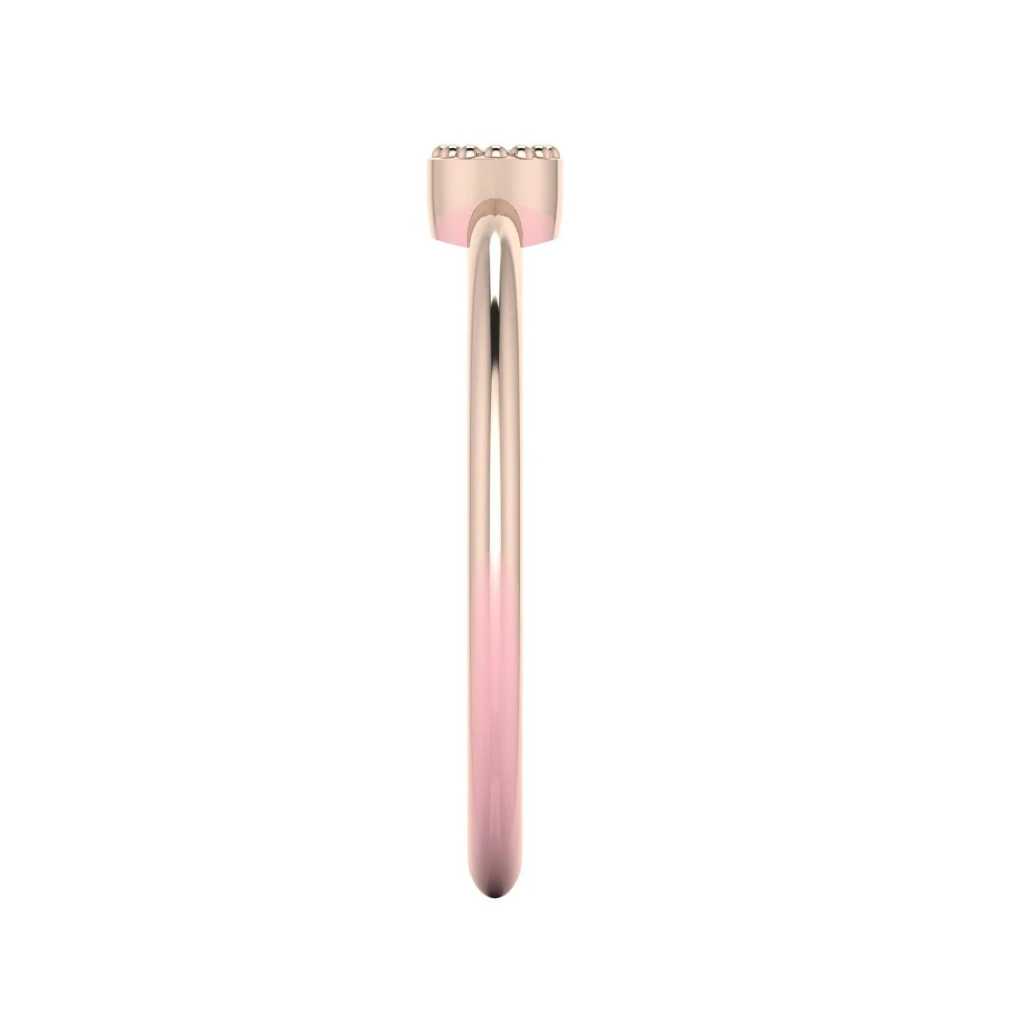 Side profile of the Mini Astraea ruby ring showing the secure setting and slender 18ct rose gold band.