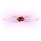 Top view of a dainty marquise ruby ring in 18ct white gold with horizontal stone orientation.