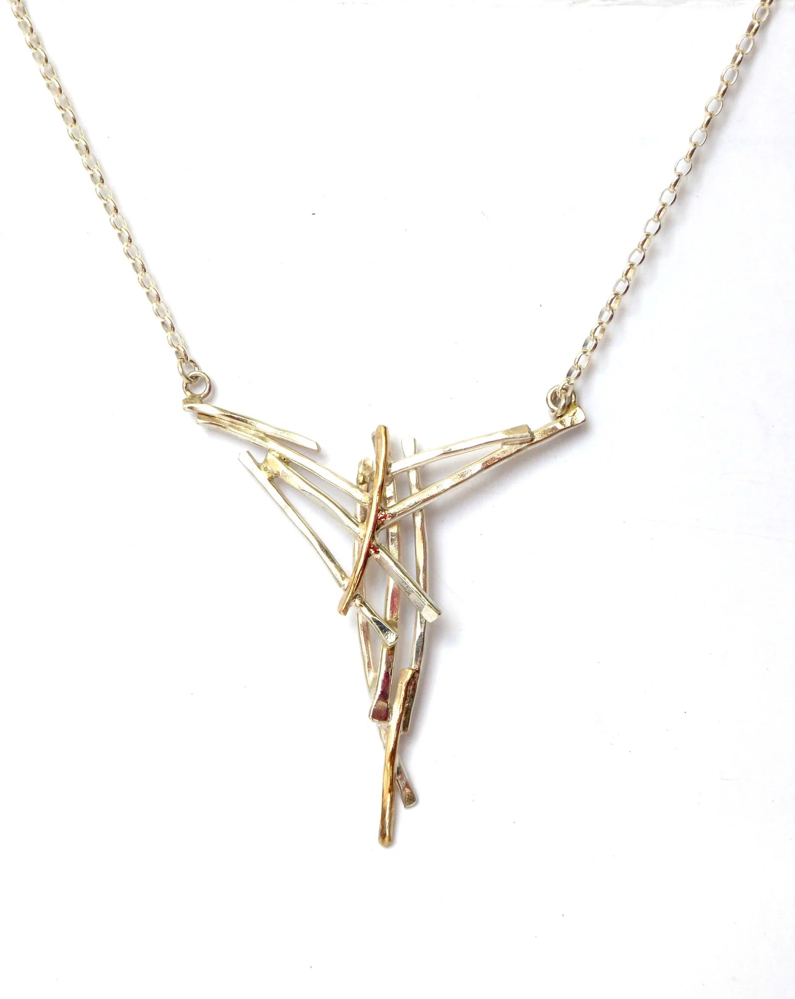 silver and gold abstract statement necklace