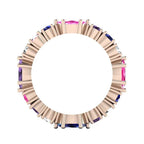A through-finger view of the Allsorts multi-coloured ring showing the internal rose gold band and stone symmetry.