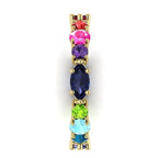 Close-up side view of the 18ct yellow gold Allsorts ring highlighting the blue to green for the multi-coloured gemstones.