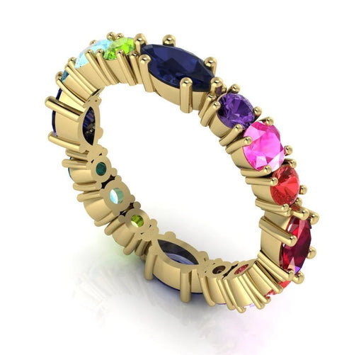 Profile view of the multi-coloured Allsorts eternity ring in 18ct yellow gold showing the alternating gemstone heights.