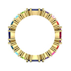 Looking through the band of the yellow gold Allsorts ring. This view demonstrates the solid construction and the open-back settings designed to allow maximum light through the colourful gemstones.