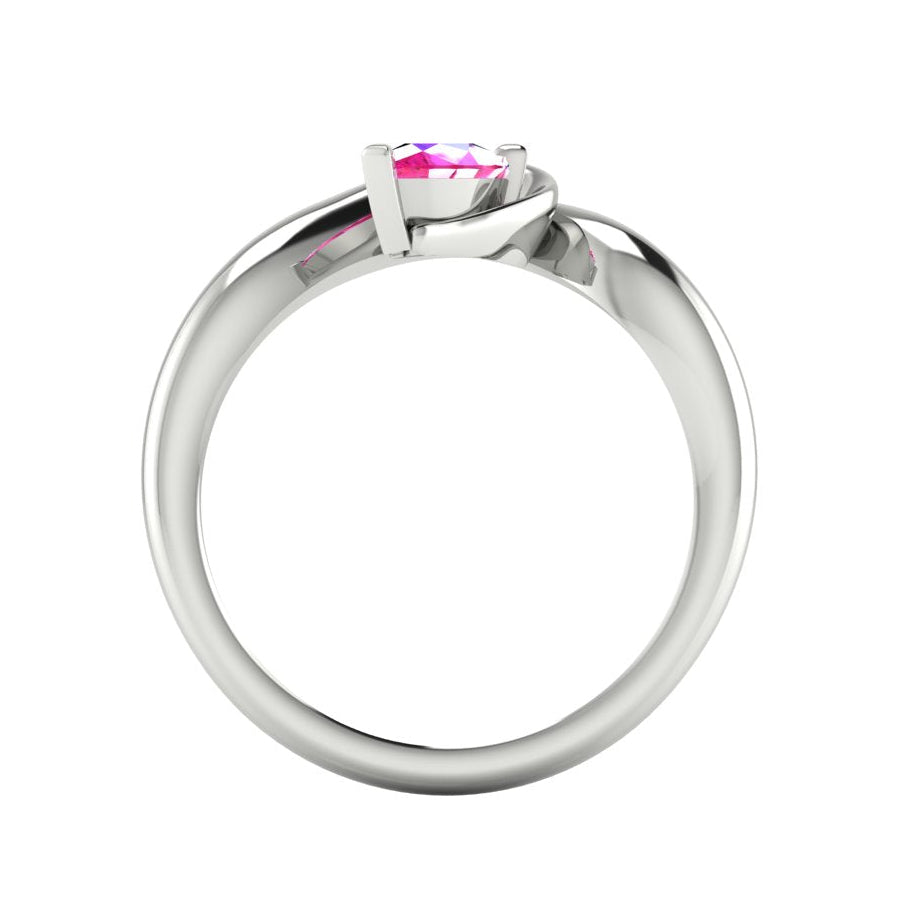 Enchanted pear pink sapphire ring in white gold, through-finger view showing clean interior band and low-set asymmetric profile