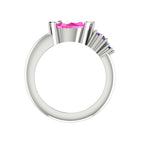Pear shaped pink sapphire, violet sapphire and blue sapphire asymmetrical Comet engagement ring in 18ct white gold, front view showing stone setting detail