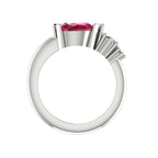 Pear shaped ruby and two diamond asymmetrical Comet engagement ring in 18ct white gold, front view showing diamond accent detail