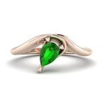 Enchanted pear-shaped tsavorite asymmetrical solitaire engagement ring top-down view — showing asymmetric setting and pear stone orientation in rose gold by Nude Jewellery