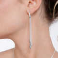 Multi Drip drop earrings in silver — model wearing long chain and bar drop earrings 