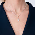 Short Single Drop Pendant in sterling silver — model close-up showing elongated droplet pendant on snake chain
