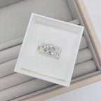 Silver Origin ring with a pink sapphire gemstone in a jewellery box
