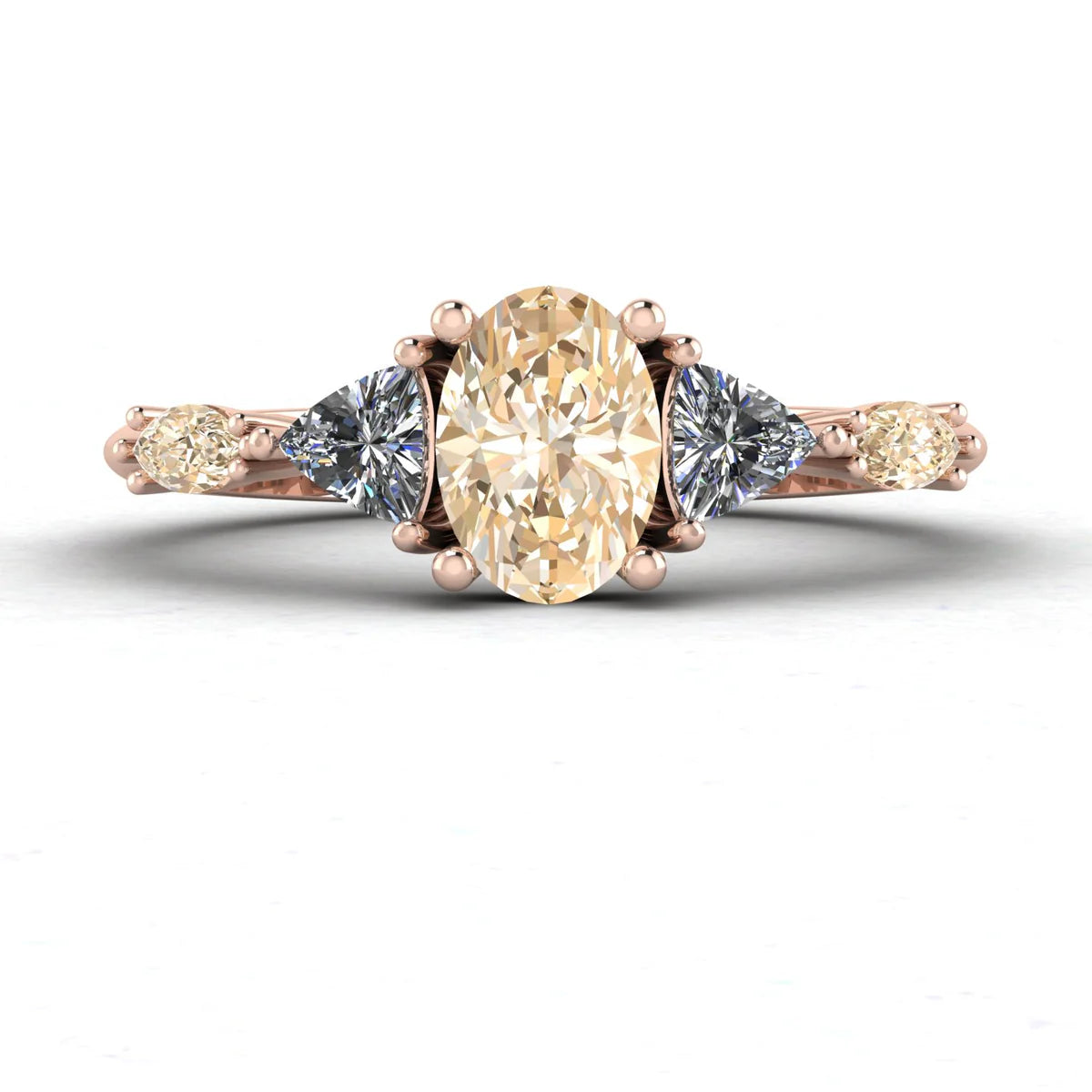 Maisie oval champagne diamond engagement ring with trillion and marquise diamond shoulders in 18ct rose gold