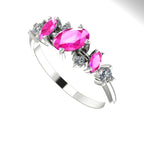 An angled view of the Atlantis Paradise ring highlighting the "beautiful chaos" of the pink sapphire and diamond arrangement.