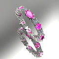 18ct white gold eternity ring featuring alternating marquise pink sapphires and white diamonds in a claw setting.