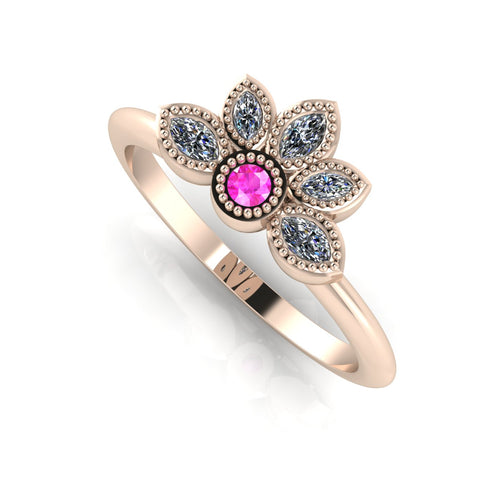 Angled perspective of a pink sapphire and diamond cluster ring in 18ct rose gold with fine milgrain textured edges.