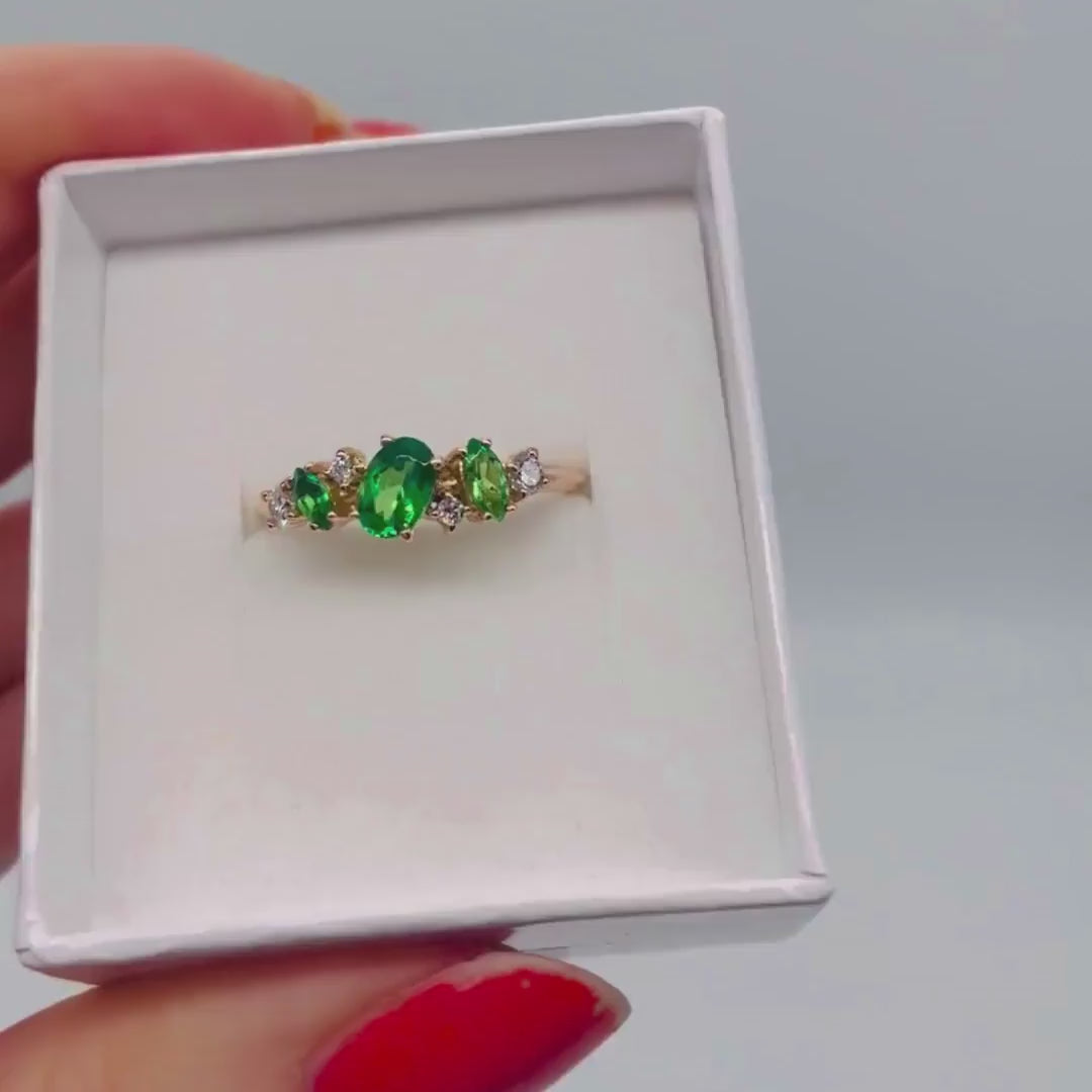 Video of the Atlantis Paradise tsavorite and diamond asymmetric cluster engagement ring in 18ct recycled rose gold — handmade in London by Nude Jewellery