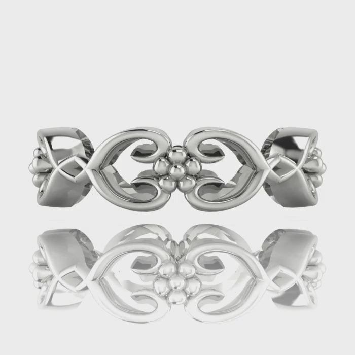 Video of Flowers On The Vine floral wedding ring in 18ct white gold, rotating to show sculptural vine and blossom detail, handmade by Nude Jewellery London