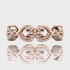 Video of Flowers On The Vine floral wedding ring in 18ct rose gold, rotating to show sculptural vine and blossom detail, handmade by Nude Jewellery London
