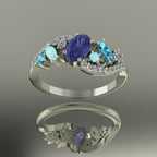Video of the Atlantis Storm ring in 18ct white gold, featuring a central tanzanite accented by blue zircons, aquamarines, and diamonds.