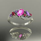 Video showcase of the Atlantis Storm ring featuring vibrant pink sapphires and rubies sparkling in 18ct white gold.
