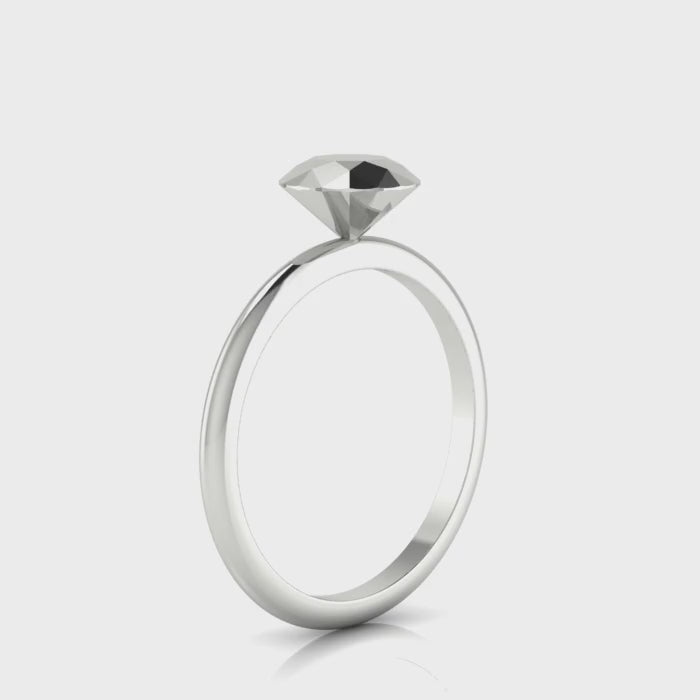 Video showcase of the Viva silver diamond rock ring, demonstrating the light reflecting off the faceted silver solitaire setting.