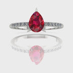 Video of the Calista ruby ring, capturing the rich, fiery crimson sparkle of the pear centre stone and its brilliant white diamond shoulders.