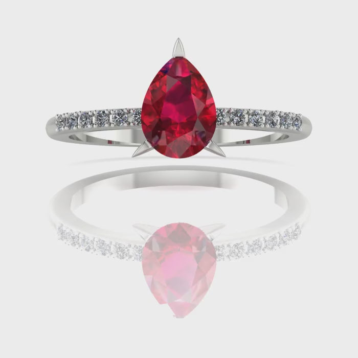 Video of the Calista ruby ring, capturing the rich, fiery crimson sparkle of the pear centre stone and its brilliant white diamond shoulders.