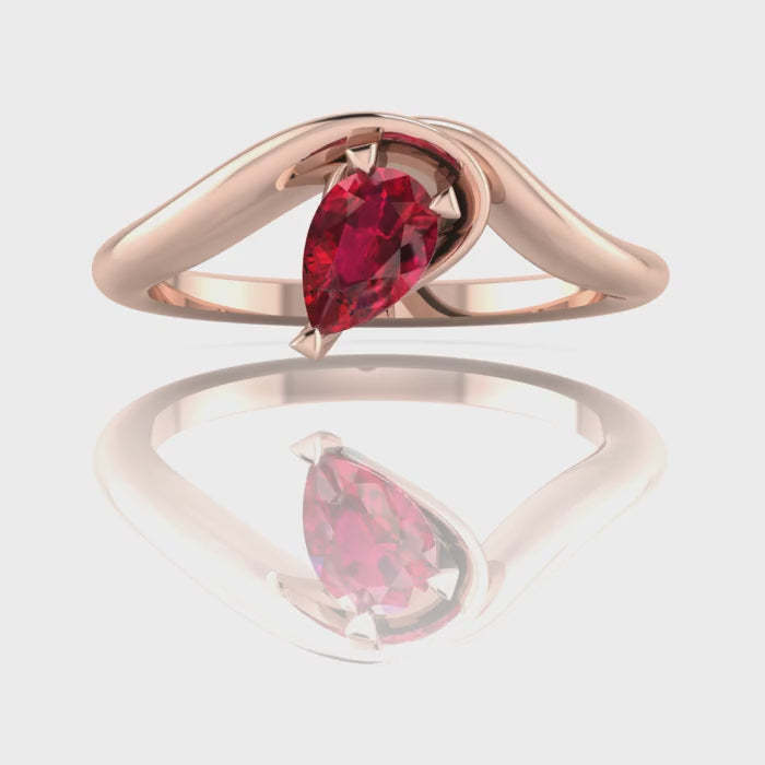 Enchanted Pear Shaped Solitaire Ruby Asymmetrical Rose Gold Ring