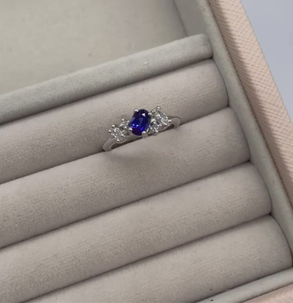 Video of the Atlantis Paradise blue sapphire and diamond asymmetric cluster engagement ring in platinum or 18ct recycled white gold — handmade in London by Nude Jewellery
