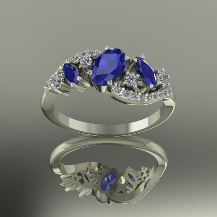 Video of the Atlantis Storm ring in 18ct white gold, showing the deep velvet blue of the sapphires and the sparkle of white diamonds.
