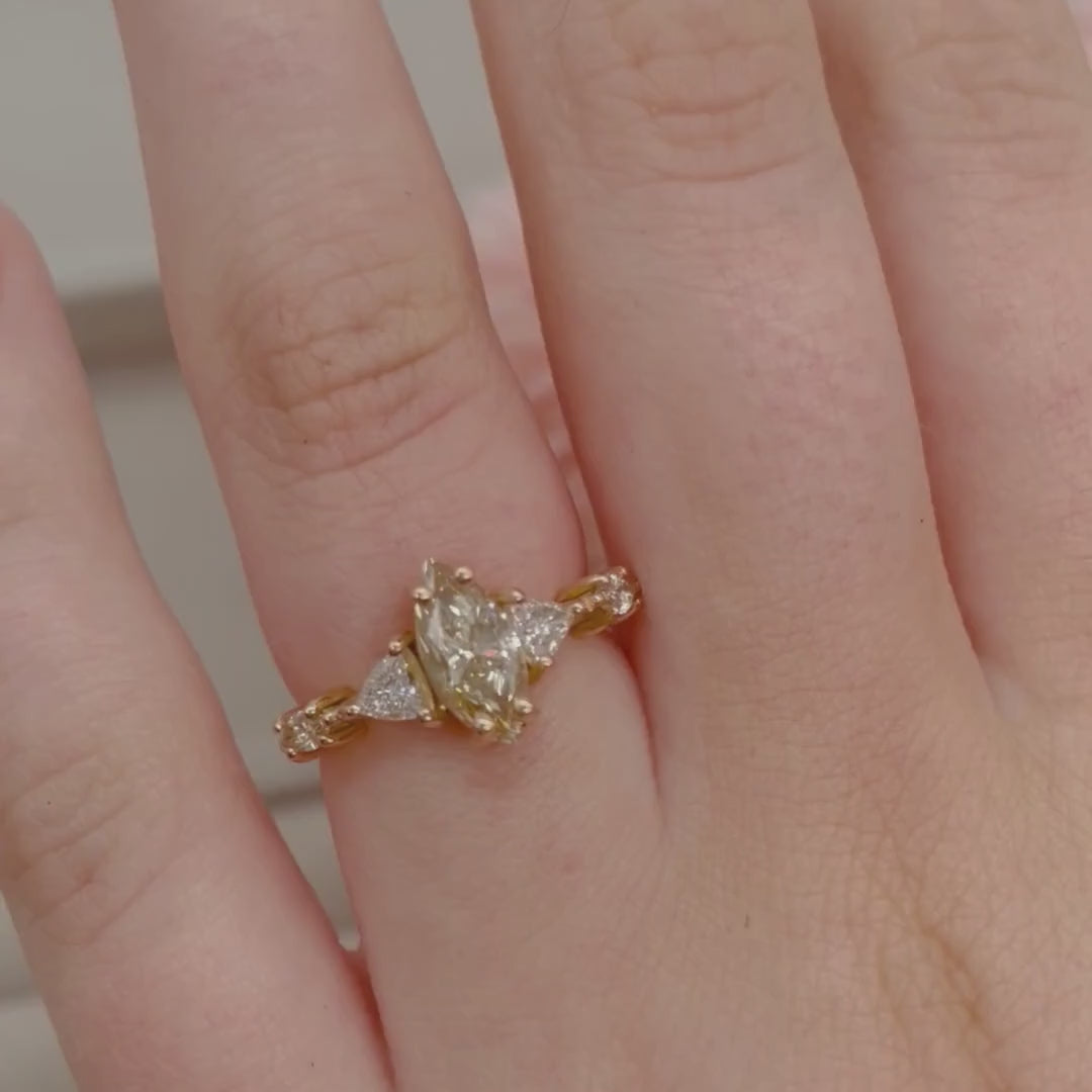 Maisie marquise champagne diamond engagement ring in 18ct rose gold, rotating 360° studio video showing the marquise diamond and delicate setting, handmade in our London studio