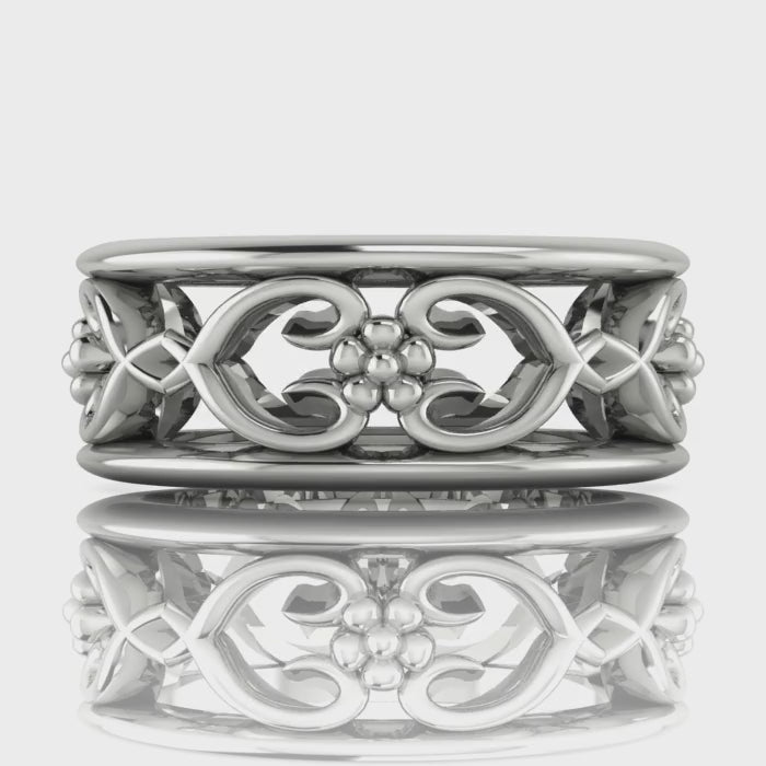 Video of Flowers On The Vine floral wedding ring in 18ct white gold, rotating to show sculptural vine and blossom detail, handmade by Nude Jewellery London