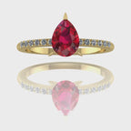 Video of the Calista ruby ring in 18ct yellow gold, capturing the rich, fiery crimson sparkle of the pear centre stone and its brilliant white diamond shoulders.