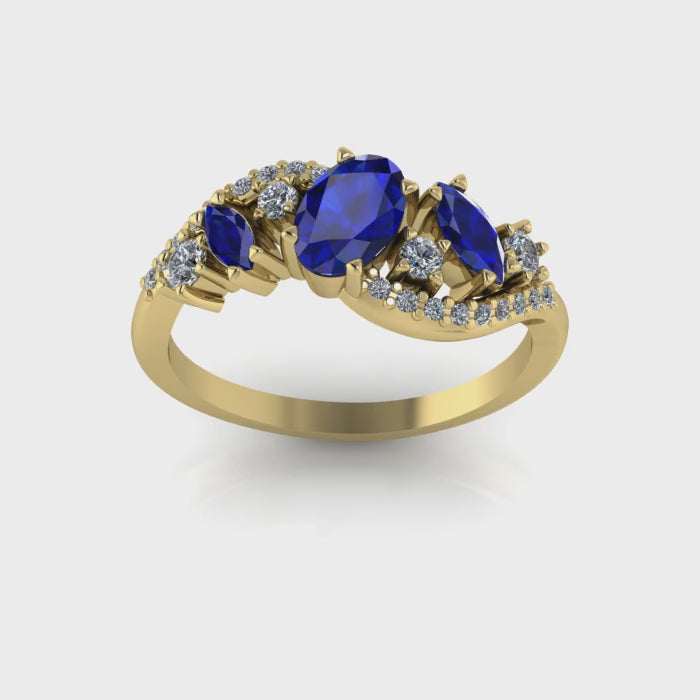 Video of the Atlantis Storm ring in 18ct yellow gold, showing the intense sparkle of brilliant-cut white diamonds against deep blue sapphires.