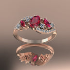 Video of the Atlantis Storm ring in 18ct rose gold, showcasing the rich, fiery sparkle of a cluster of rubies and brilliant-cut white diamonds.