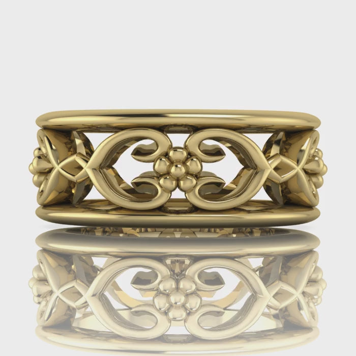 Video of Flowers On The Vine floral wedding ring in 18ct yellow gold, rotating to show sculptural vine and blossom detail, handmade by Nude Jewellery London
