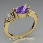 Comet Ring: Pear Shaped Violet Sapphire & Diamond's Ring