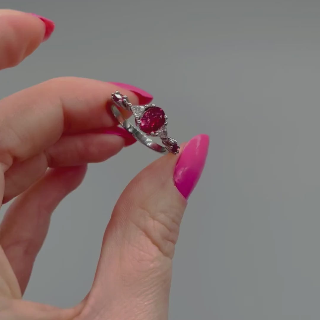 Video of the Maisie oval ruby and diamond engagement ring in 18ct recycled white gold or platinum — handmade in London by Nude Jewellery