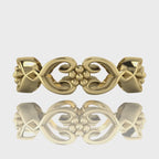 Video of Flowers On The Vine floral wedding ring in 18ct yellow gold, rotating to show sculptural vine and blossom detail, handmade by Nude Jewellery London
