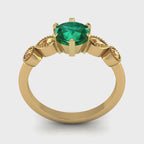 Video of the Milena emerald and yellow sapphire five-stone engagement ring, handmade in London by Nude Jewellery