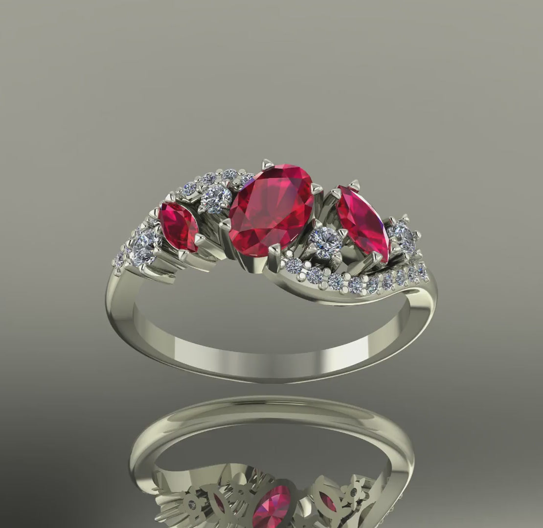Video of the Atlantis Storm ring in 18ct white gold, featuring vibrant red rubies and brilliant-cut white diamonds.