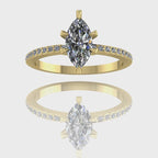 A 360-degree video of the Amoret diamond engagement ring in 18ct yellow gold. The footage highlights the sparkle of the central marquise diamond and the pavé-set shoulder diamonds against the high-polish golden band.