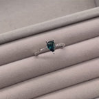 Calista pear shaped teal sapphire and diamond engagement ring in 18ct white gold, rotating 360° studio video showing the vivid teal sapphire and diamond shoulders, handmade in our London studio