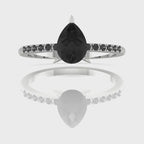 Video of the Calista ring, highlighting the brilliant white accent diamonds framing the central black pear diamond.