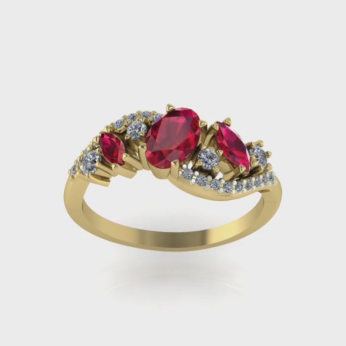 Video of the Atlantis Storm ring in 18ct yellow gold, showcasing the vibrant red rubies and brilliant white diamonds catching the light.