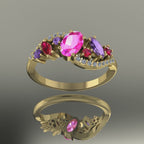 Video of the Atlantis Storm ring in 18ct yellow gold, capturing the rich sparkle of pink and violet sapphires, rubies, and diamonds.