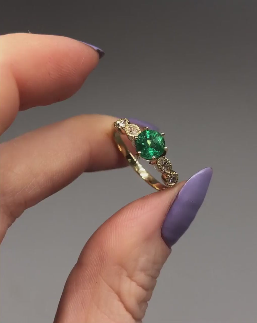 The Milena emerald and diamond five gemstone engagement ring